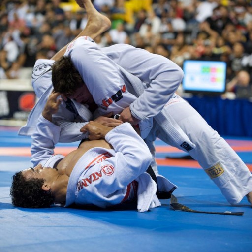 photo of martial arts competitors grappling